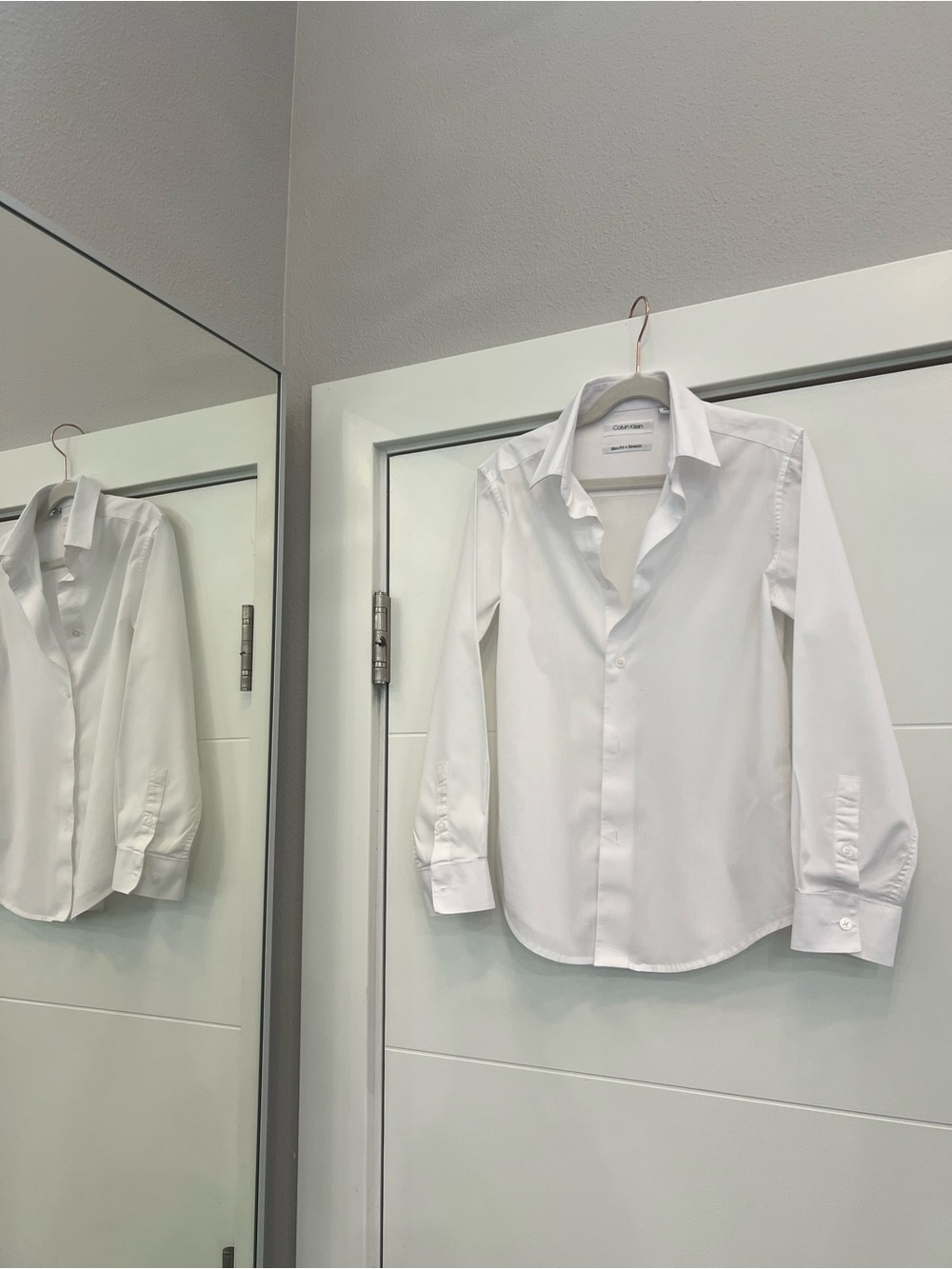 Calvin Klein white button down shirt size 10 like new